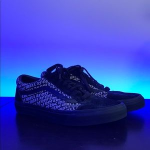 Black “off the wall” vans